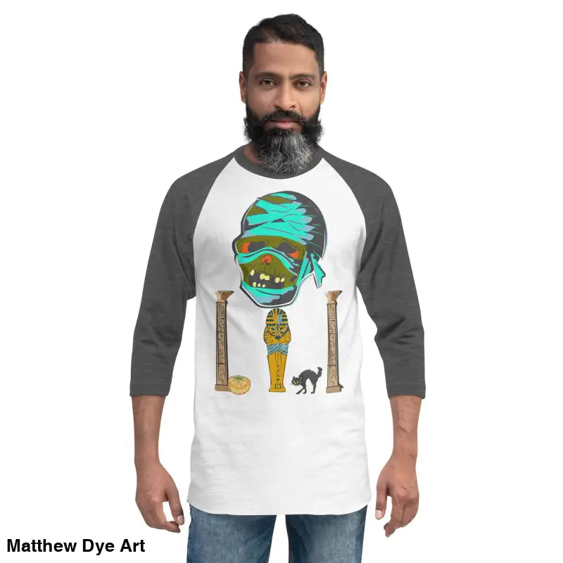 Halloween-themed raglan shirt featuring Matthew Dye art and mystical mummy charm design