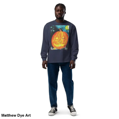Man wearing a Pumpkin Mischief long sleeve featuring Matthew Dye Art’s whimsical Jack-o’-Lantern