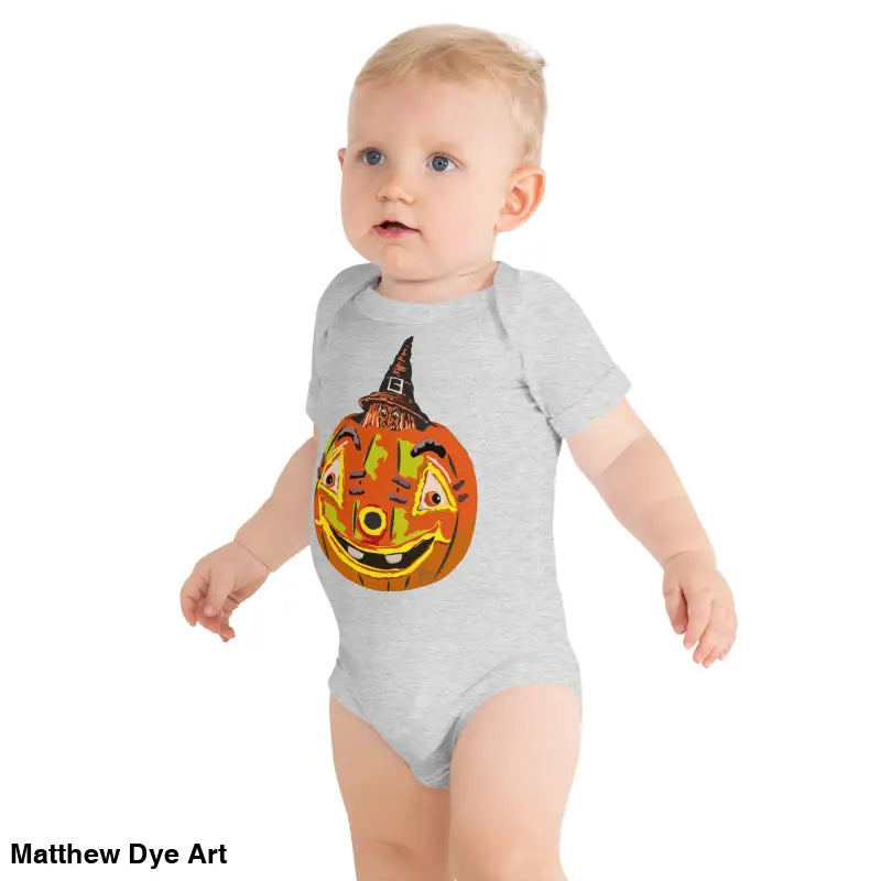 Baby in a comfortable onesie featuring a vintage-inspired Halloween design of a Pumpkin Witch