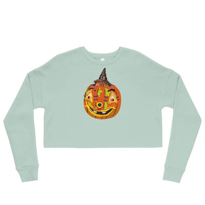 Mint green crop sweatshirt featuring a smiling jack-o’-lantern in a witch hat design