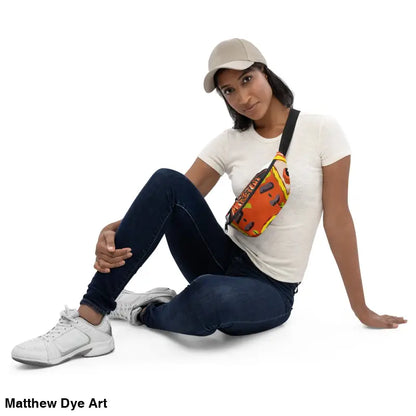 Woman showcasing the Pumpkin Witch Fanny Pack featuring Matthew Dye art and vintage design