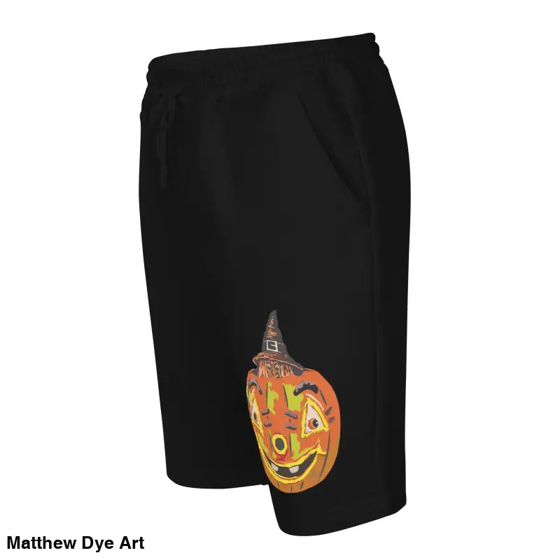 Black Halloween-themed Pumpkin Witch Fleece Shorts for men featuring Matthew Dye art