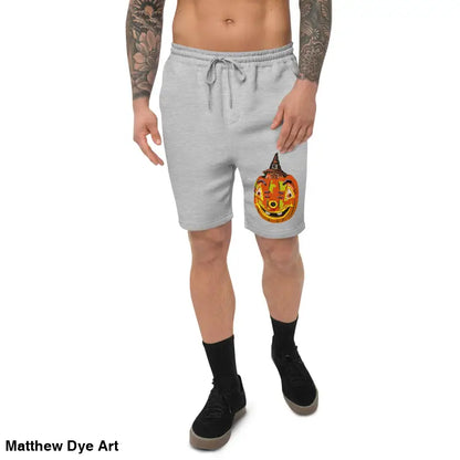 Gray shorts featuring a pumpkin design from Matthew Dye Art for the Pumpkin Witch men’s fleece