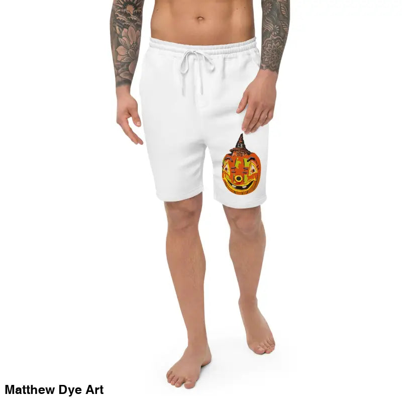 White shorts featuring a pumpkin design from the Pumpkin Witch Fleece Shorts collection