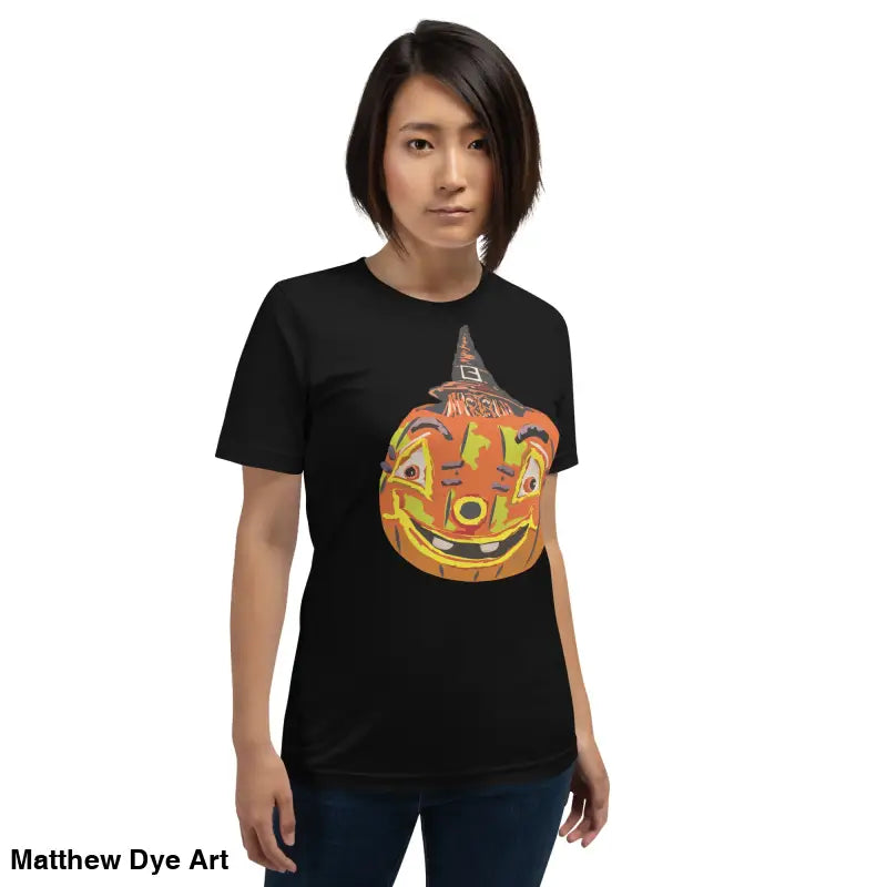 Black t-shirt featuring pumpkin witch graphic, perfect for Halloween celebrations