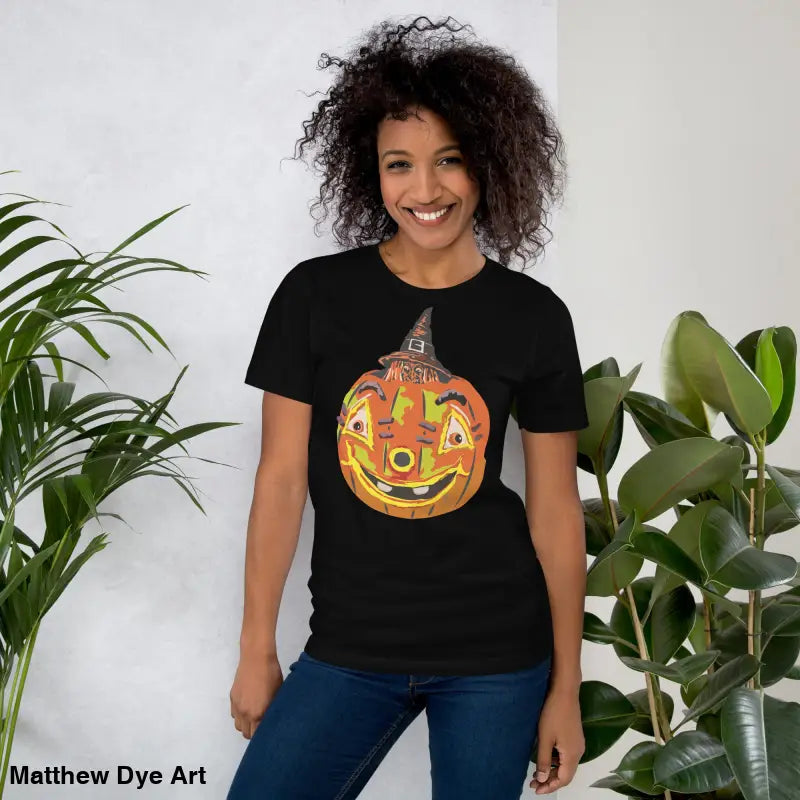 Black Halloween t-shirt featuring a pumpkin witch graphic on a comfortable cotton tee