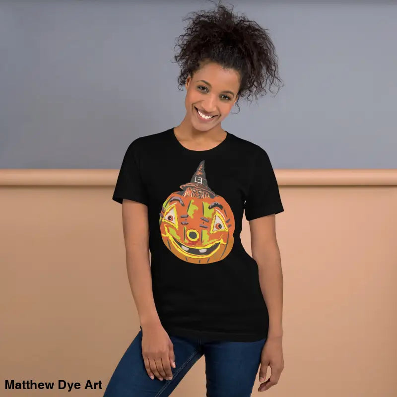 Black t-shirt featuring pumpkin graphic for comfortable cotton pumpkin witch unisex tee