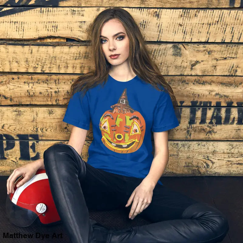 Comfortable cotton pumpkin witch unisex tee featuring a blue t-shirt with pumpkin graphic