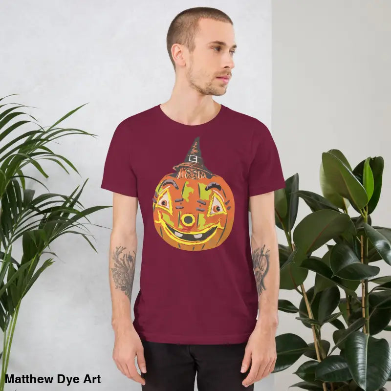 Burgundy t-shirt featuring a pumpkin graphic from the comfortable cotton Pumpkin Witch unisex tee