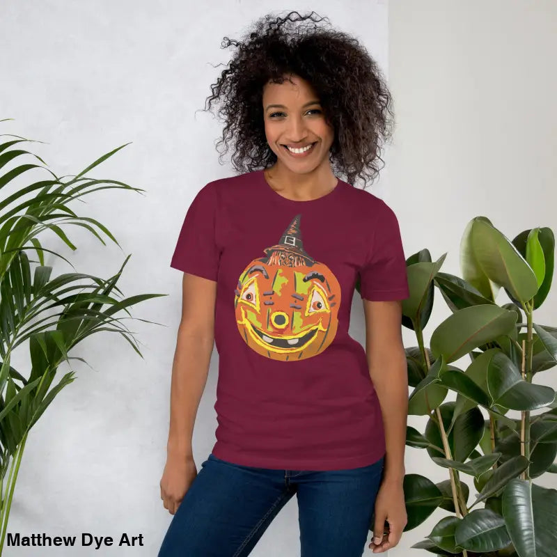 Burgundy Halloween t-shirt featuring a pumpkin witch graphic on a comfortable cotton tee