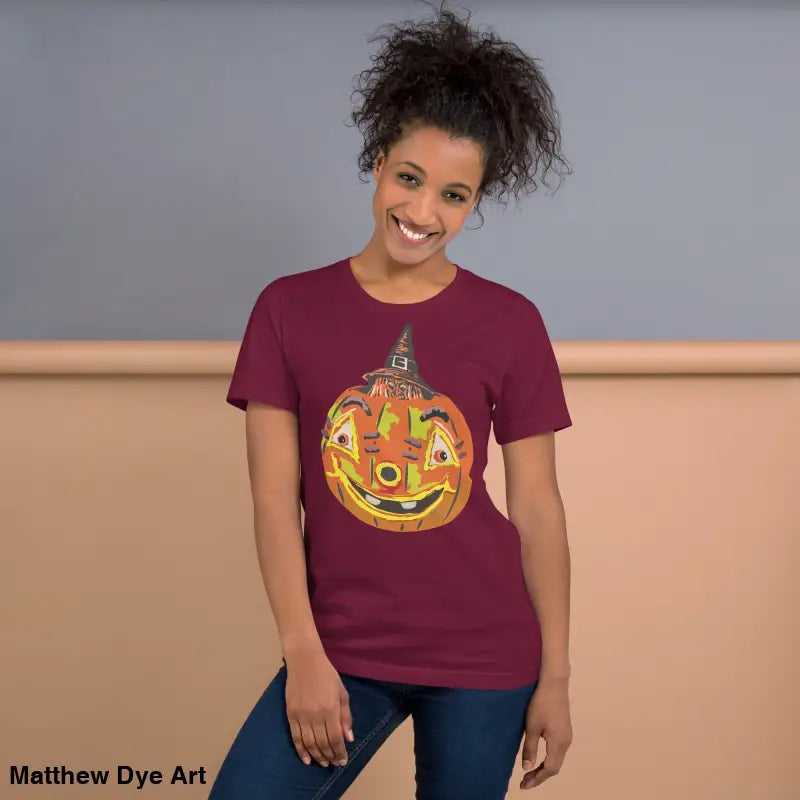 Maroon Halloween t-shirt featuring a pumpkin witch graphic on comfortable cotton unisex tee