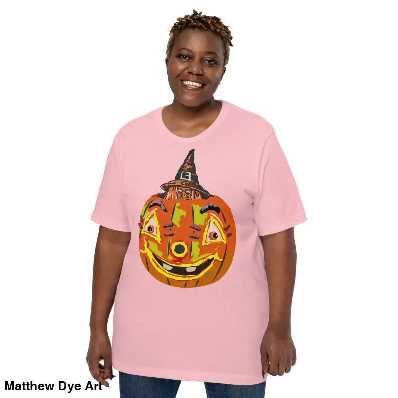 Pink t-shirt featuring pumpkin witch graphic, perfect comfortable cotton Halloween tee