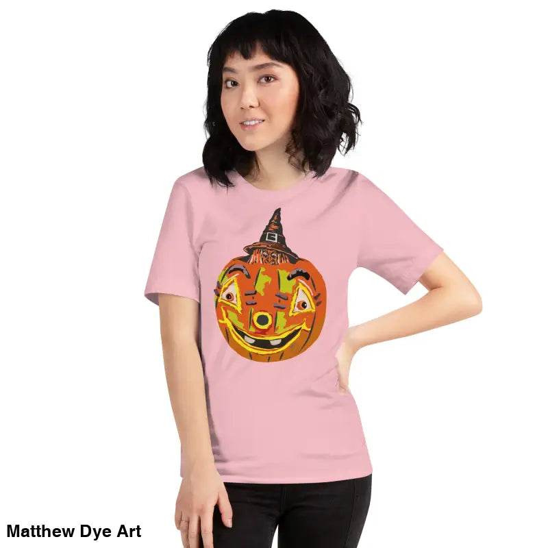 Pink t-shirt featuring a pumpkin graphic from the Pumpkin Witch Mischief Halloween tee