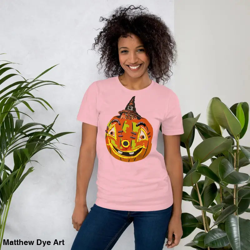 Pink Halloween t-shirt featuring a pumpkin witch graphic on a comfortable cotton tee