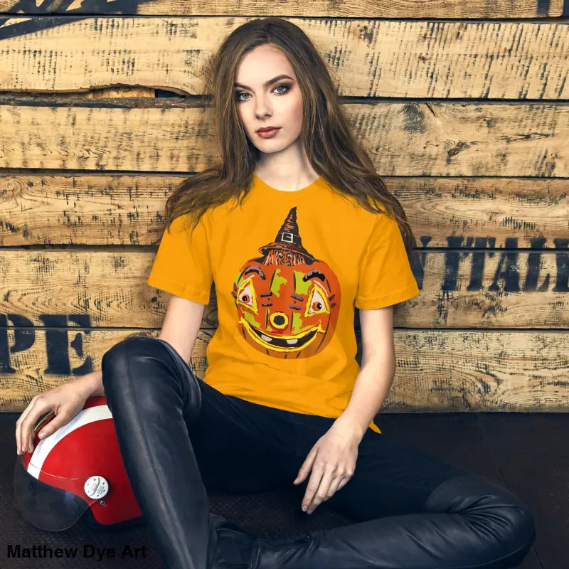 Comfortable cotton pumpkin witch unisex tee in vibrant orange for Halloween festivities