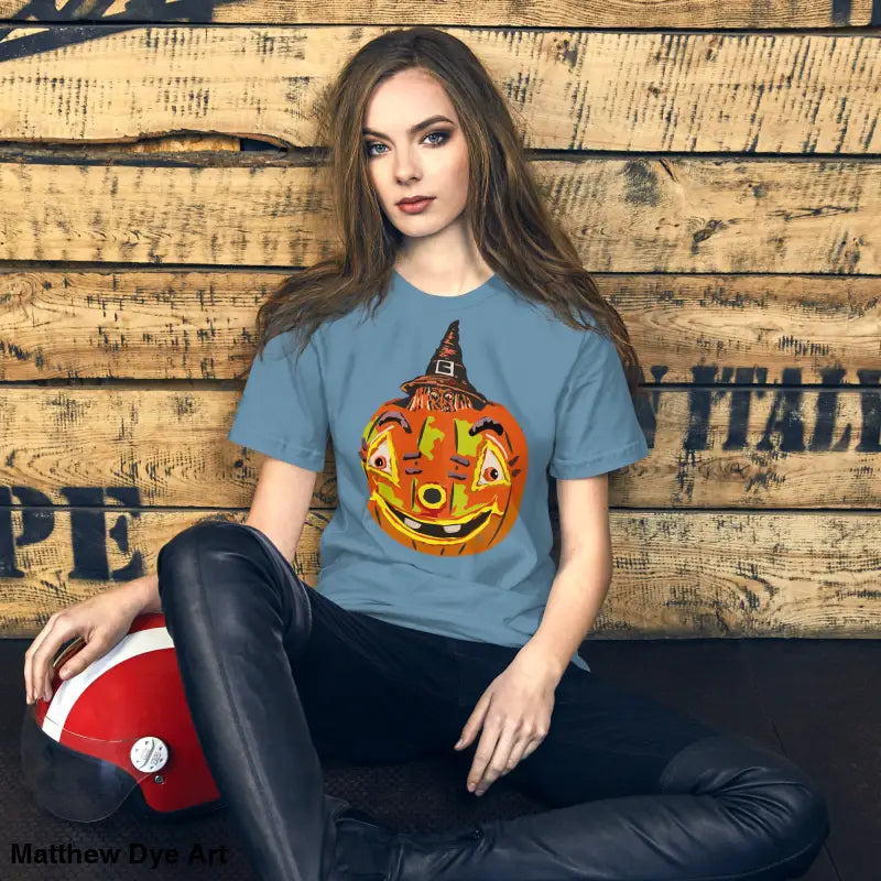 Comfortable cotton pumpkin witch unisex tee featuring Halloween theme and playful design