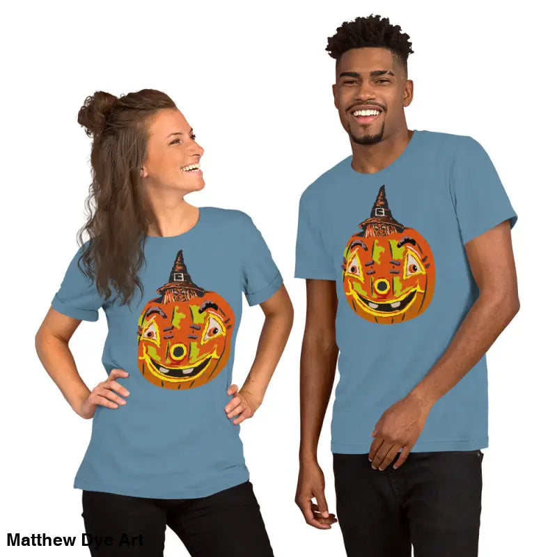 Two people in matching Halloween t-shirts featuring a comfortable cotton pumpkin witch design