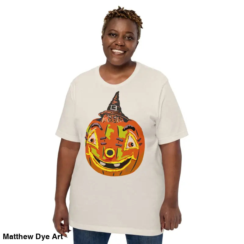 Woman wearing a comfortable cotton pumpkin witch unisex tee for Halloween festivities