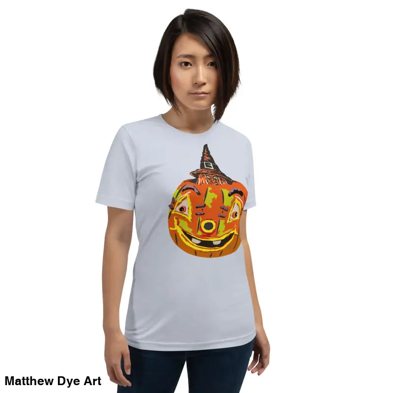 Woman in a comfortable cotton pumpkin witch unisex tee for Halloween festivities