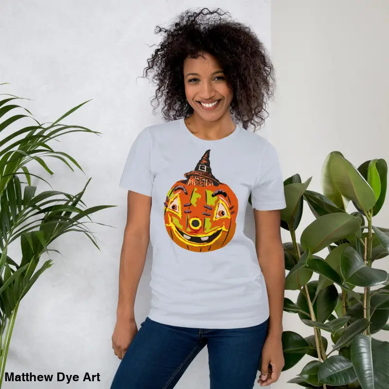 Woman showcasing a comfortable cotton pumpkin witch unisex tee for Halloween festivities