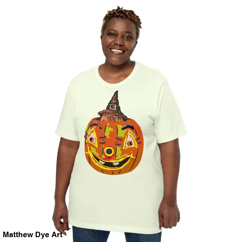 Woman wearing a comfortable cotton pumpkin witch unisex tee for Halloween festivities
