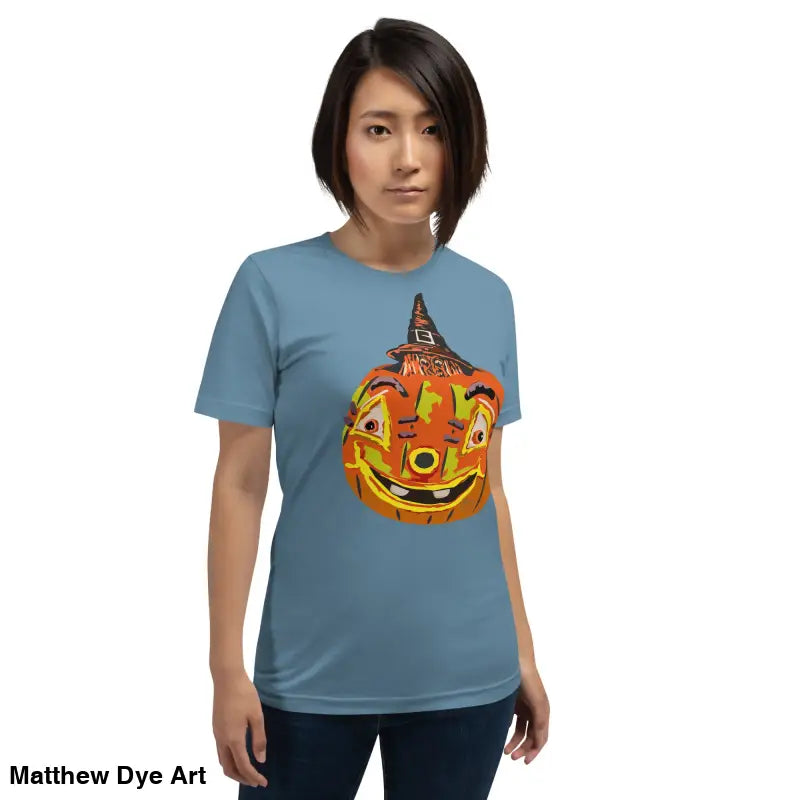 Woman’s blue t-shirt featuring a pumpkin graphic, perfect for Halloween enthusiasts