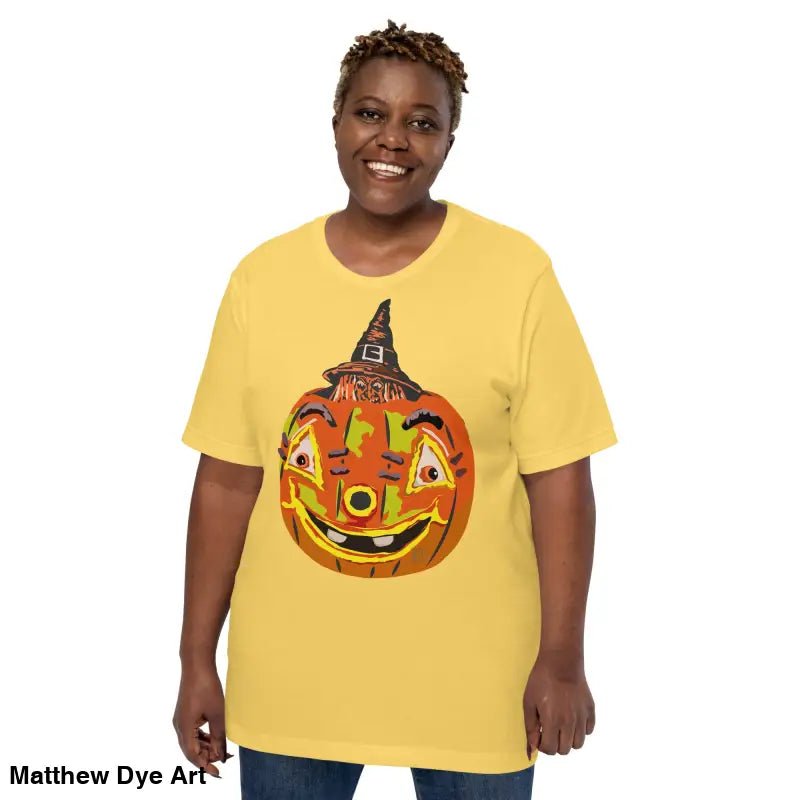 Yellow Halloween t-shirt featuring a pumpkin witch graphic on comfortable cotton unisex tee