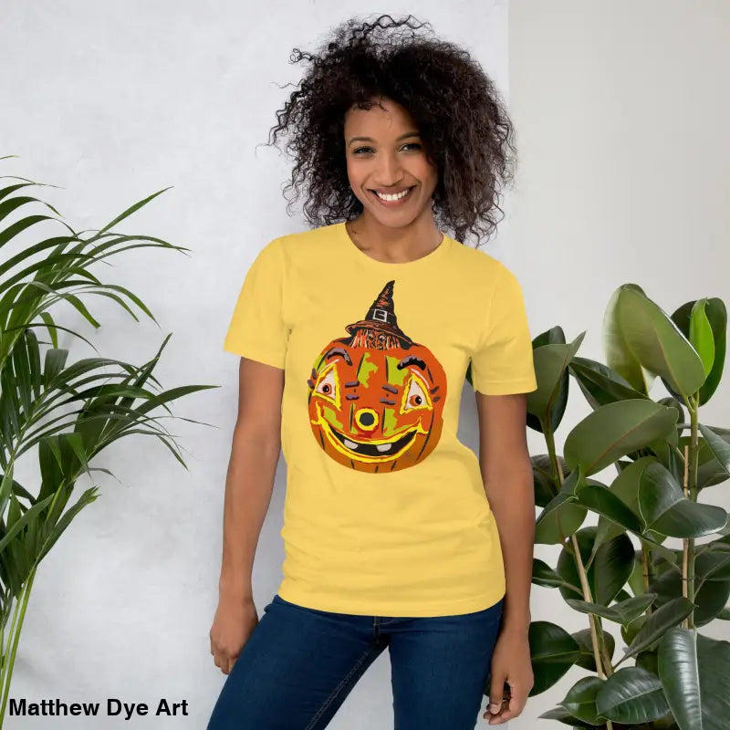Yellow t-shirt featuring pumpkin graphic, a comfortable cotton Pumpkin Witch unisex tee