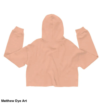 Peach-colored cropped hoodie featuring an enchanted pumpkin witch design for Halloween
