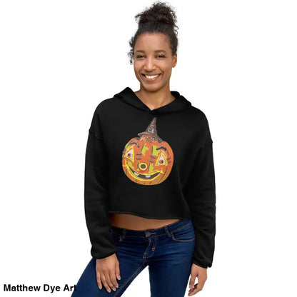 Black cropped hoodie featuring a vintage Halloween pumpkin graphic for an enchanted look