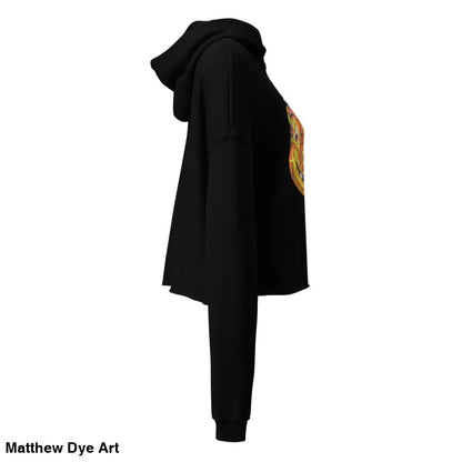 Black cropped hoodie featuring an enchanted pumpkin witch design for Halloween