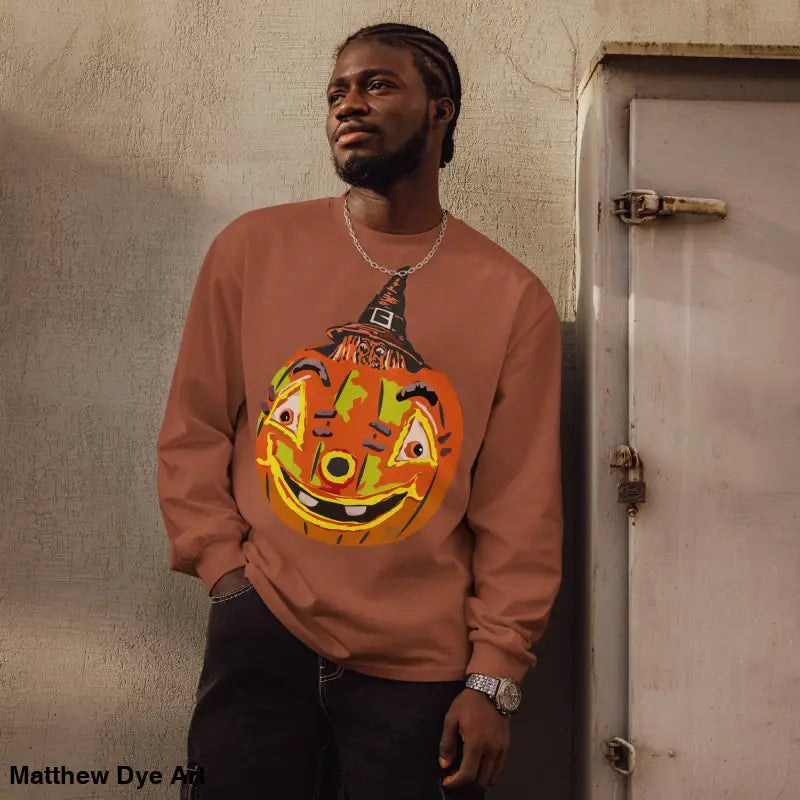 Premium long sleeve Halloween shirt featuring a cozy jack-o’-lantern design