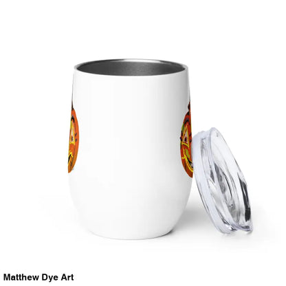 White insulated wine tumbler with lid featuring Matthew Dye art of a whimsical pumpkin witch