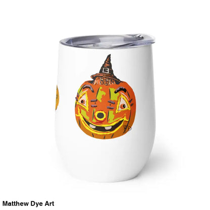 White tumbler featuring whimsical pumpkin witch design by Matthew Dye Art