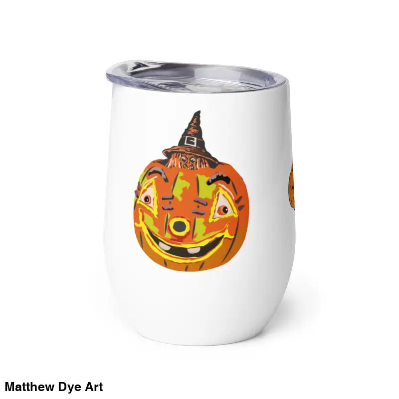 White tumbler with whimsical pumpkin witch design by Matthew Dye Art for Halloween