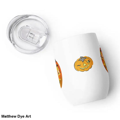 White tumbler featuring whimsical pumpkin witch designs and clear lid from Matthew Dye Art