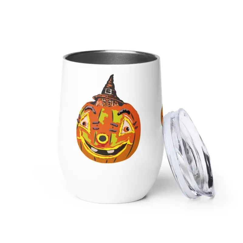White tumbler featuring whimsical pumpkin witch design by Matthew Dye Art for Halloween-themed drinks