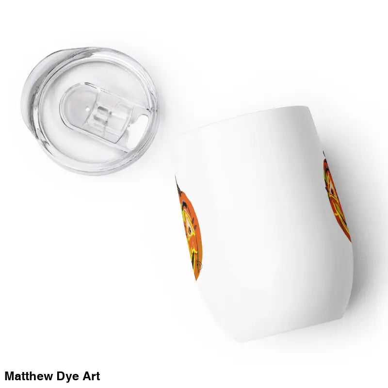 White tumbler with lid featuring whimsical pumpkin witch design by Matthew Dye Art