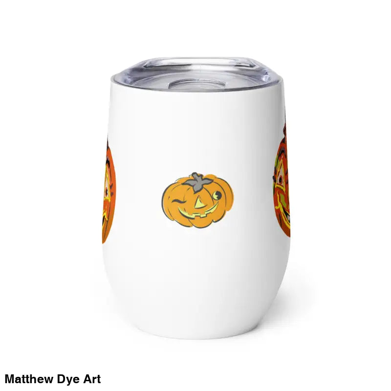 White tumbler featuring whimsical pumpkin witch designs, perfect for Halloween festivities