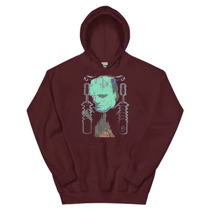 Maroon hoodie featuring a glowing green Frankenstein’s design for a retro Halloween aesthetic