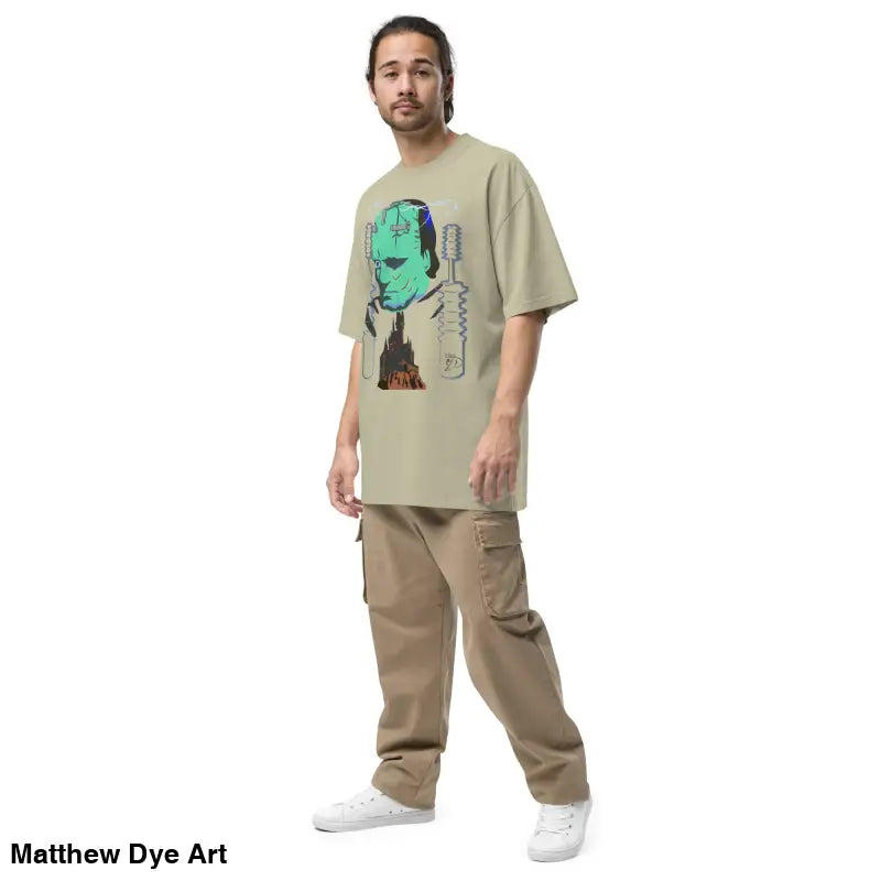 Man in Retro Franky Oversized T-Shirt showcasing Matthew Dye art on a tempestuous autumn night