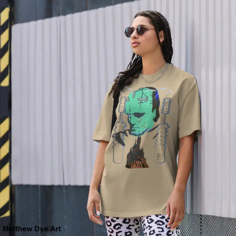 Woman models Retro Franky Oversized T-Shirt featuring Matthew Dye art for a tempestuous autumn night