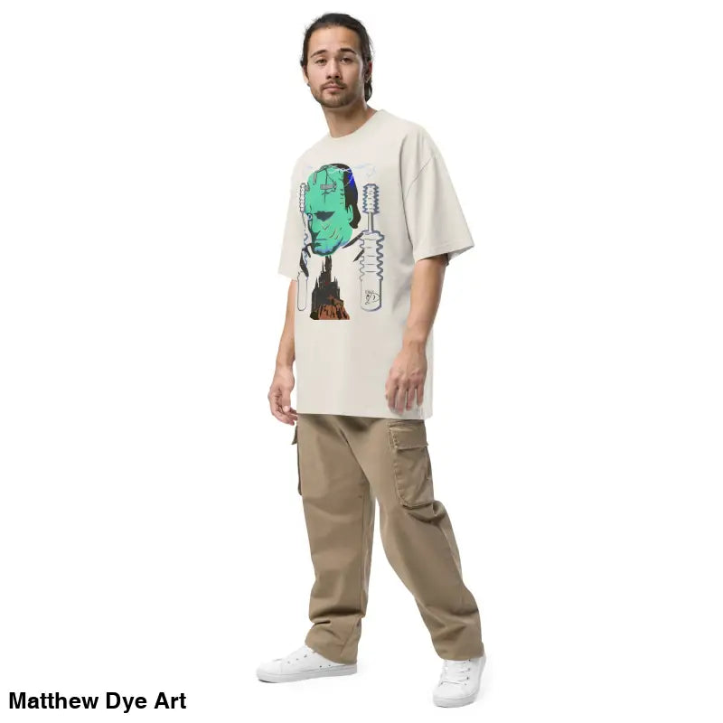 Man in Retro Franky Oversized T-Shirt featuring Matthew Dye art and cargo pants