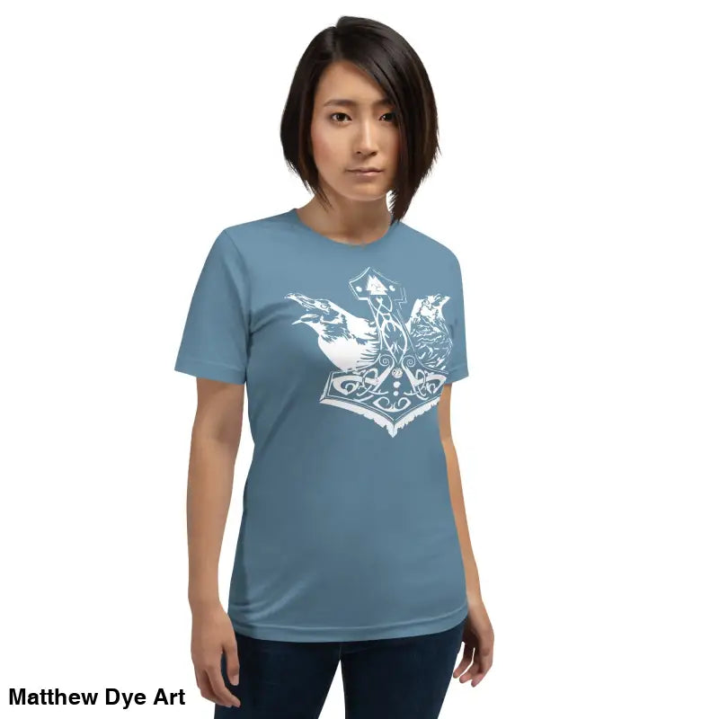 Blue t-shirt with white graphic from Odin’s Chosen Tee—transcends mere apparel