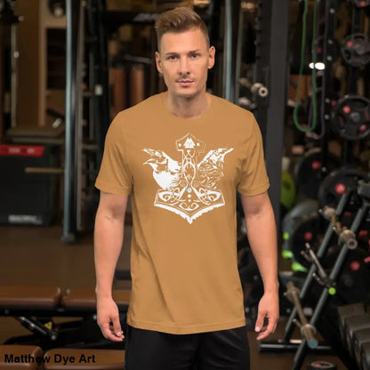 Man in golden-brown Odin’s Chosen tee featuring a striking Viking design