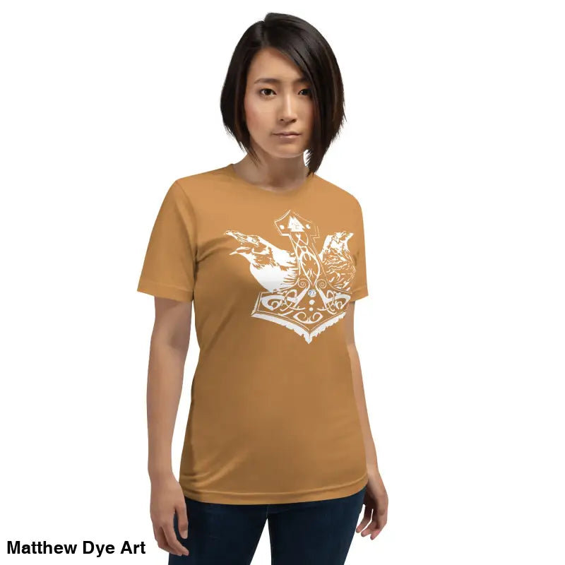 Woman models Odin’s Chosen Tee, a remarkable Norse art apparel in brown and white