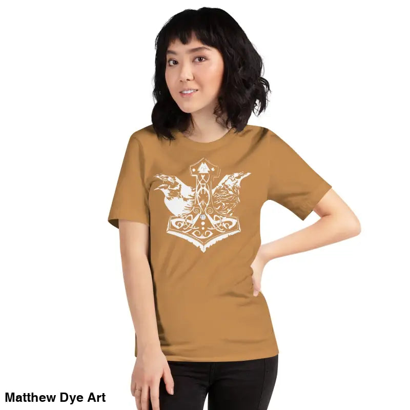 Woman in a brown Odin’s Chosen tee featuring a white Norse-themed design
