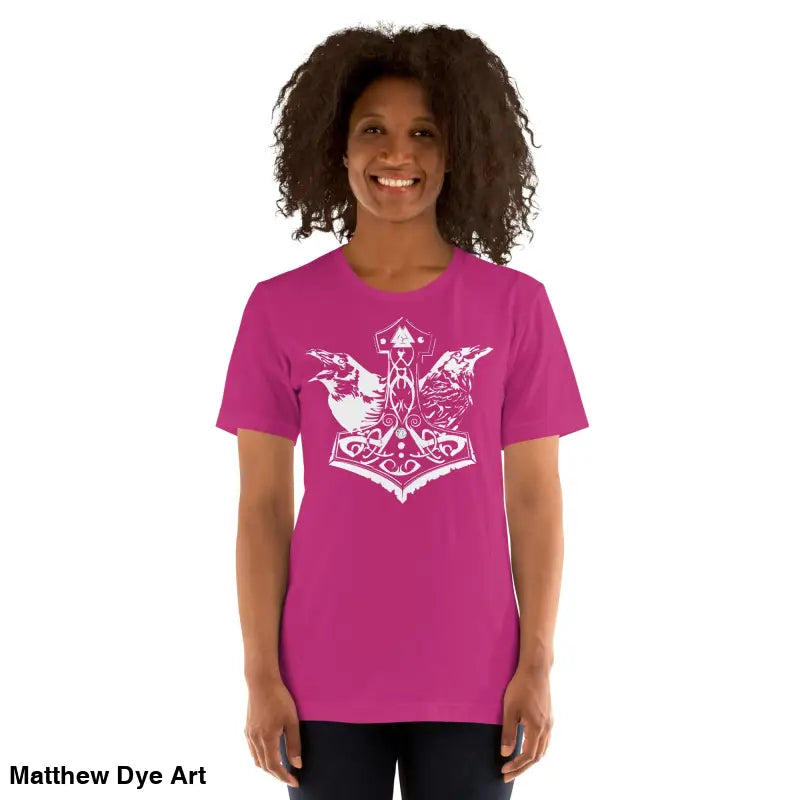 Woman in a pink Odin’s Chosen tee, showcasing unique Norse-inspired graphic art