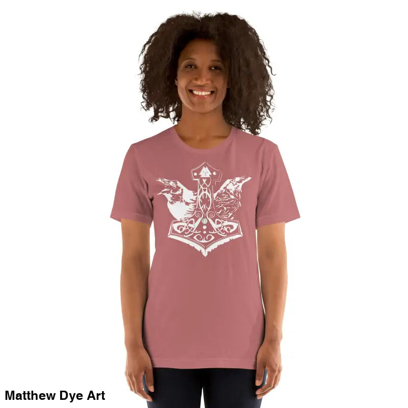 Woman in a pink Odin’s Chosen tee featuring a white Viking-themed design