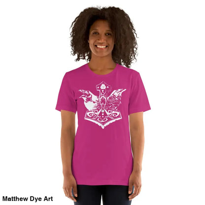 Woman in a pink Odin’s Chosen tee, showcasing unique Norse-inspired graphic art